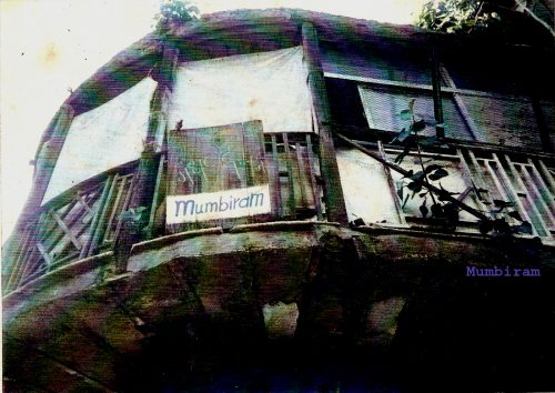 Facing North Mumbiram Facing North : the Gandharvadaman Board adorning the round balcony of Mumbiram´s legendary Mandai studio.